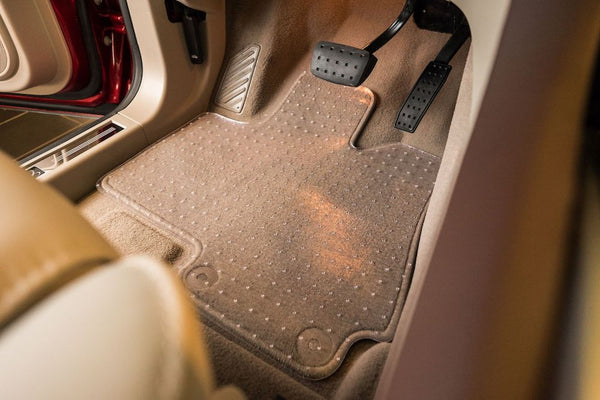 Clear ExactMat placed on top of front driver mat. Highlight