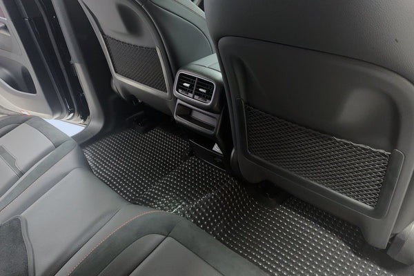 X-Mat installed in rear passenger area of vehicle. Highlight