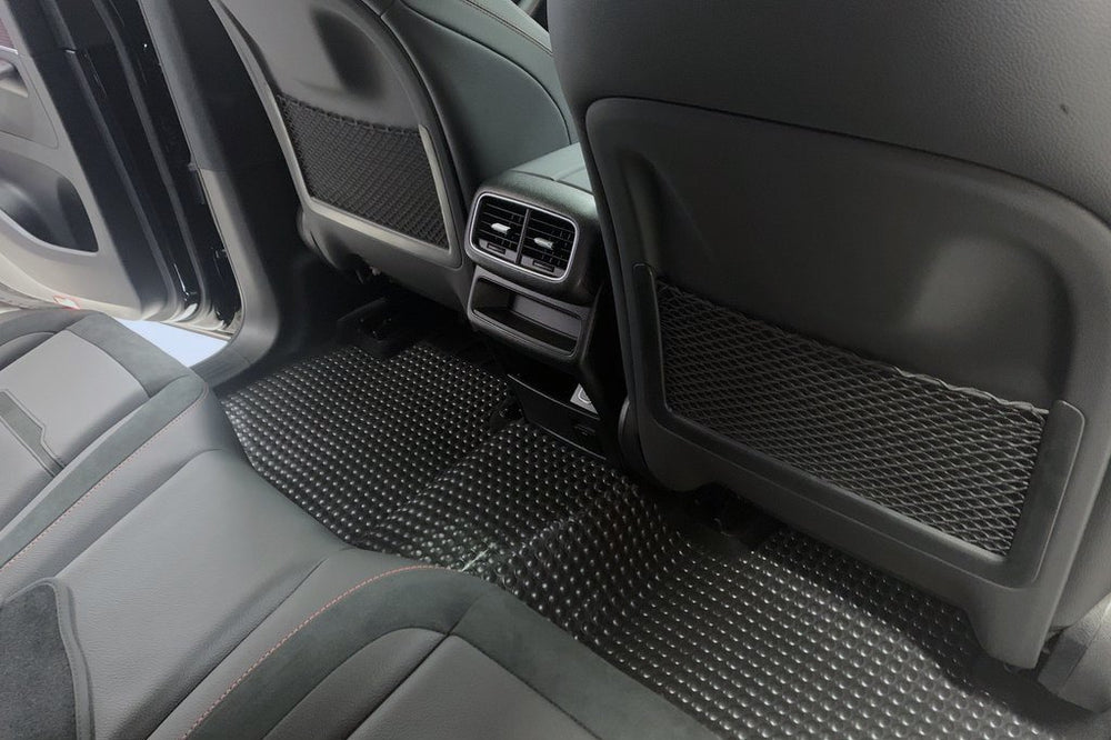 X-Mat installed in rear passenger area of vehicle. Highlight